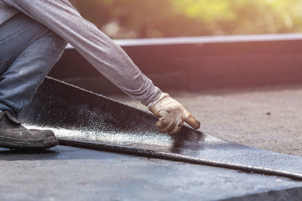 Professional Emergency Waterproofing technician working in Linwood, NJ